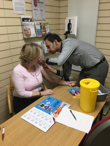 Mary Robinson MP receiving a flu jab in 2019